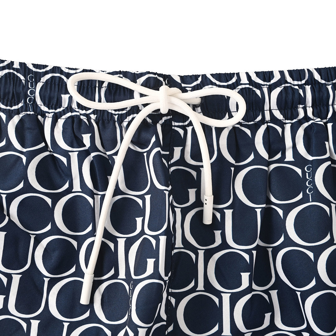 Gucci All-Over Logo Print Swim Shorts – Navy