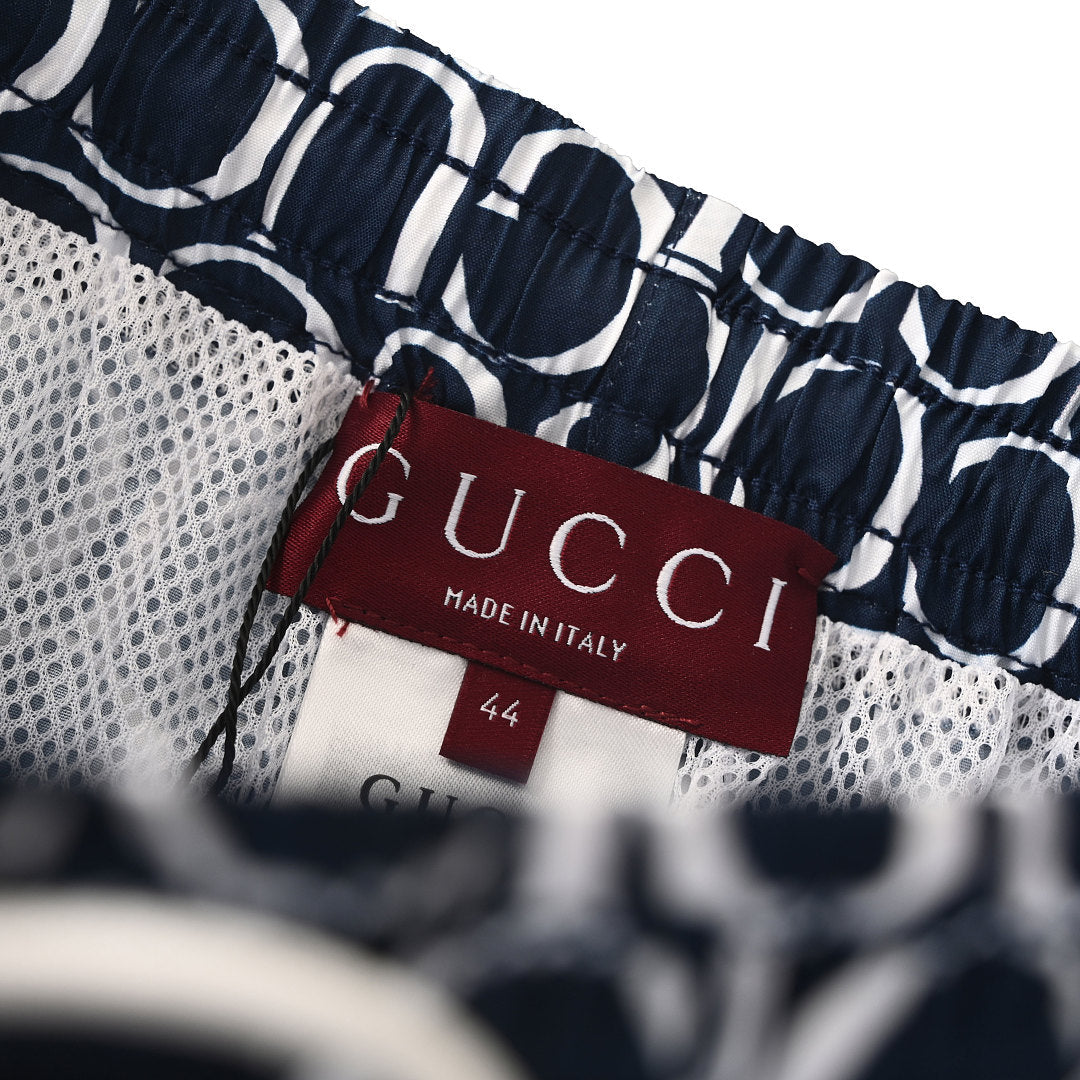 Gucci All-Over Logo Print Swim Shorts – Navy