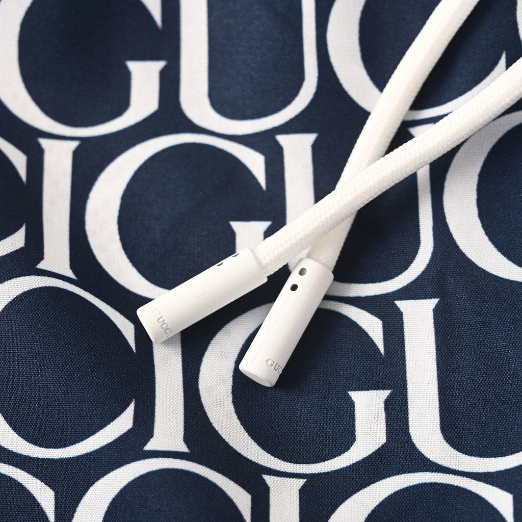 Gucci All-Over Logo Print Swim Shorts – Navy